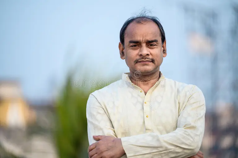 Portrait of a middle-aged man outdoors — illustrative photograph